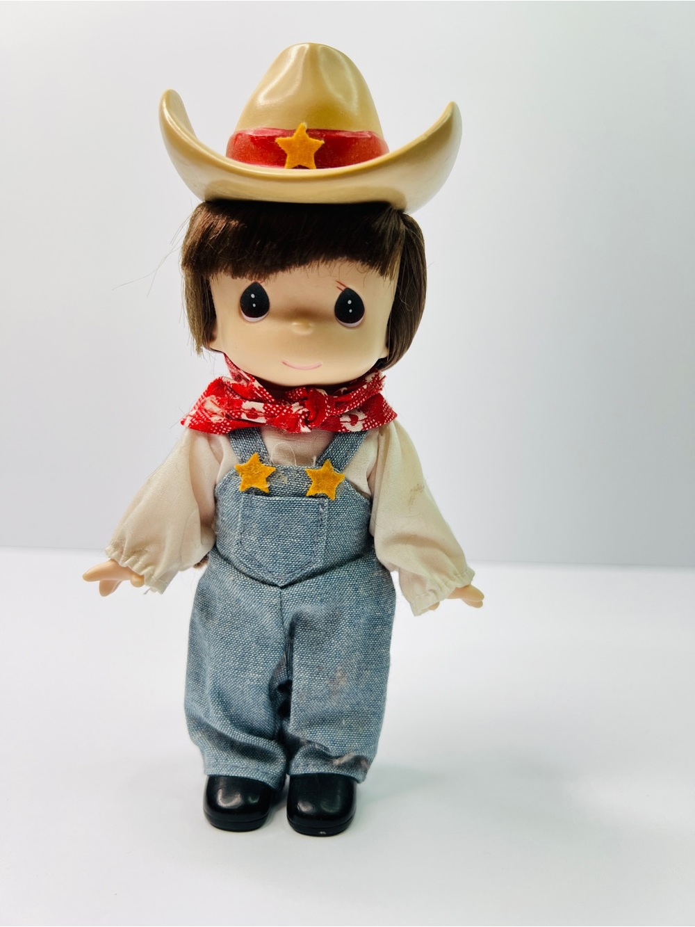 Girl Figurine Dressed Like A Cowgirl
